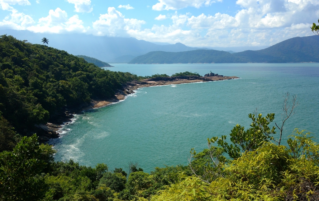 Beaches in Ubatuba, a mixture of rocks, sand and green vegetation.
