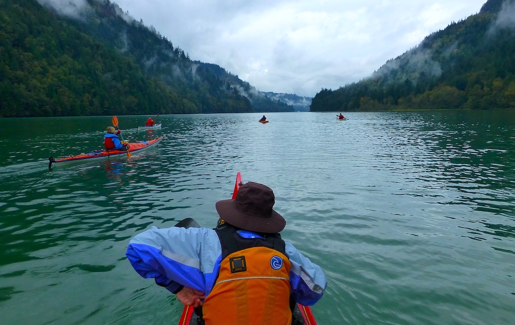 Kayakers on the Harrison River on kayak route in British Columbia, in Canada.