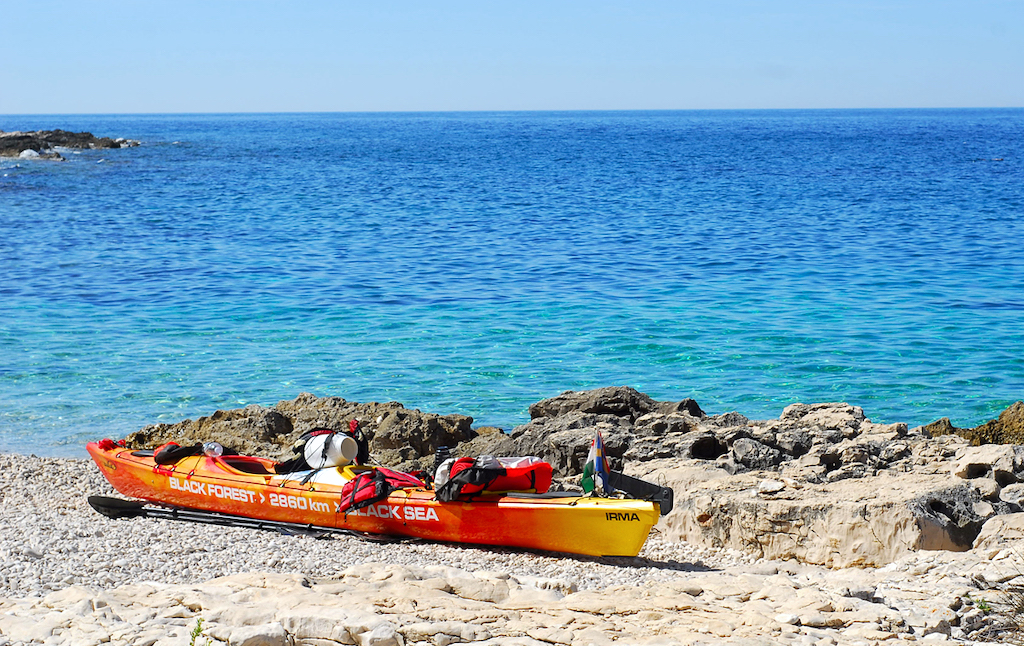 Kayak facing the Adriatic Sea on one of over 300 islands in the Zadar Archipelago, in Croatia.